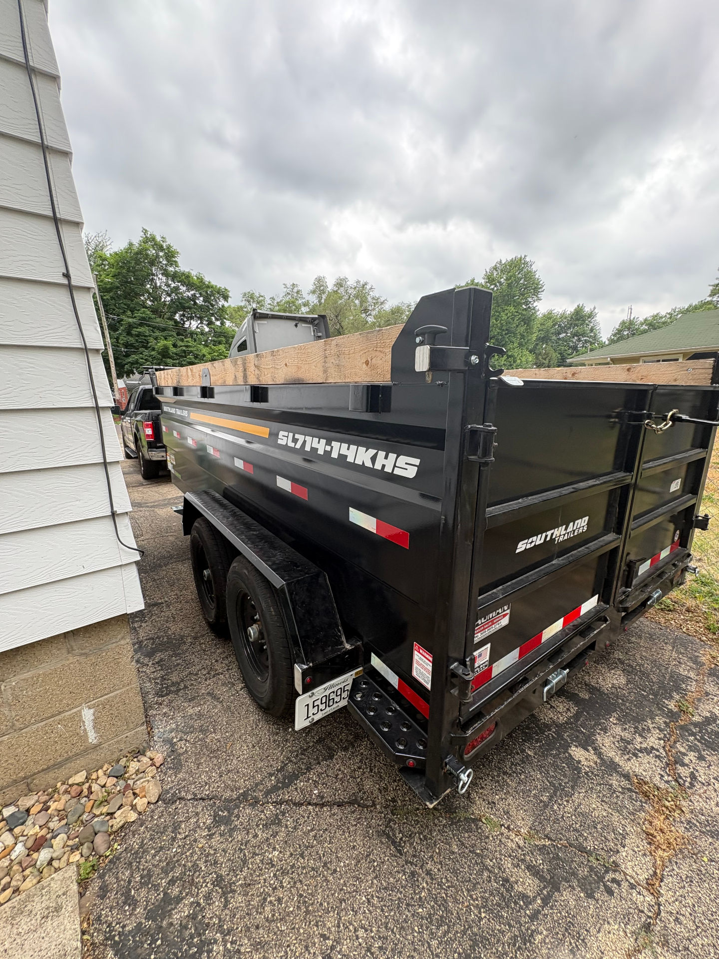 TrashDash 14-yard Southland dump trailer dropped in a residential Morton, IL driveway for a Dumpster Trailer Rental Morton IL job.